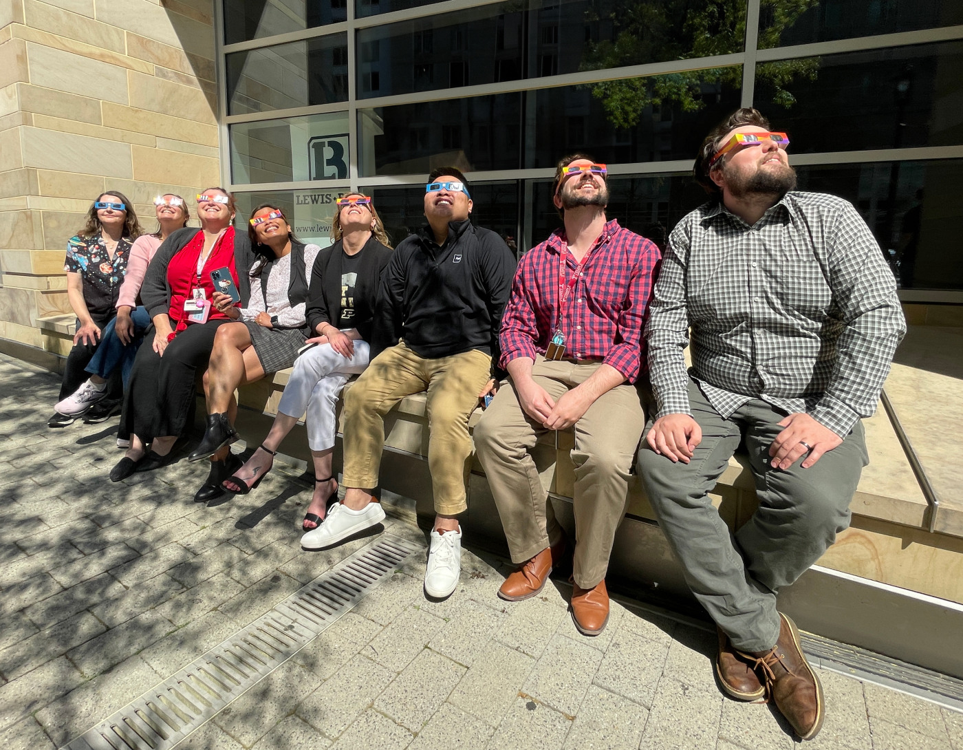 Flad Architects staff viewing solar eclipse