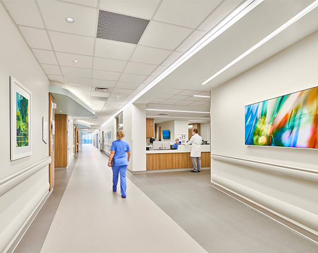 Hospital patient floor, nurse station, and hallway artwork