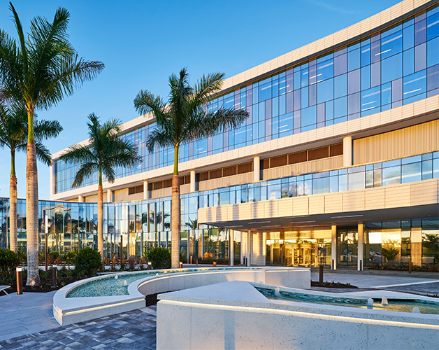 Sarasota Memorial Hospital - Venice evening building exterior entrance with fountain landscaping