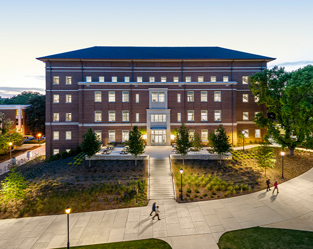 UGA Poultry Science Complex exterior captured by drone at dusk.